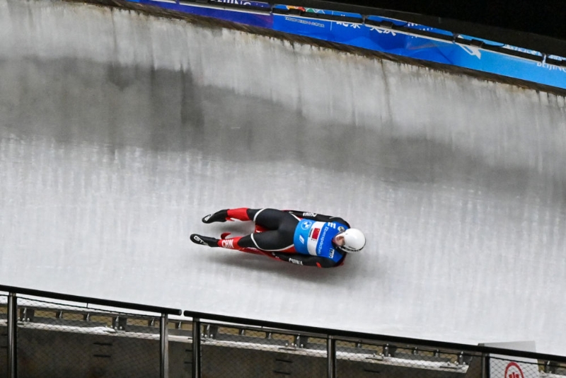 2021年11月21日，中國選手范鐸耀在“相約北京”2021/2022國際雪橇聯(lián)合會雪橇世界杯團(tuán)體接力比賽中。新華社記者陳益宸攝