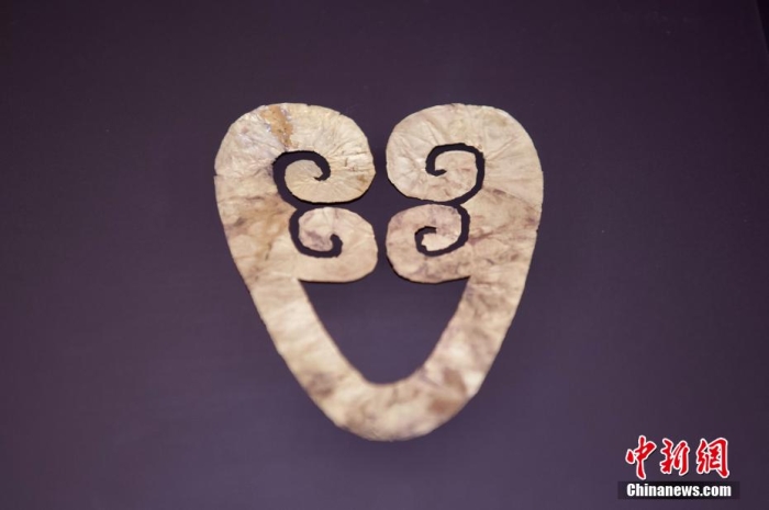 圖為金沙遺址出土的金人面像。 李志華 攝