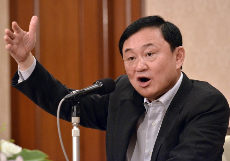 2011年8月23日，他信在日本東京出席新聞發(fā)布會(huì)。（圖源：新華社）